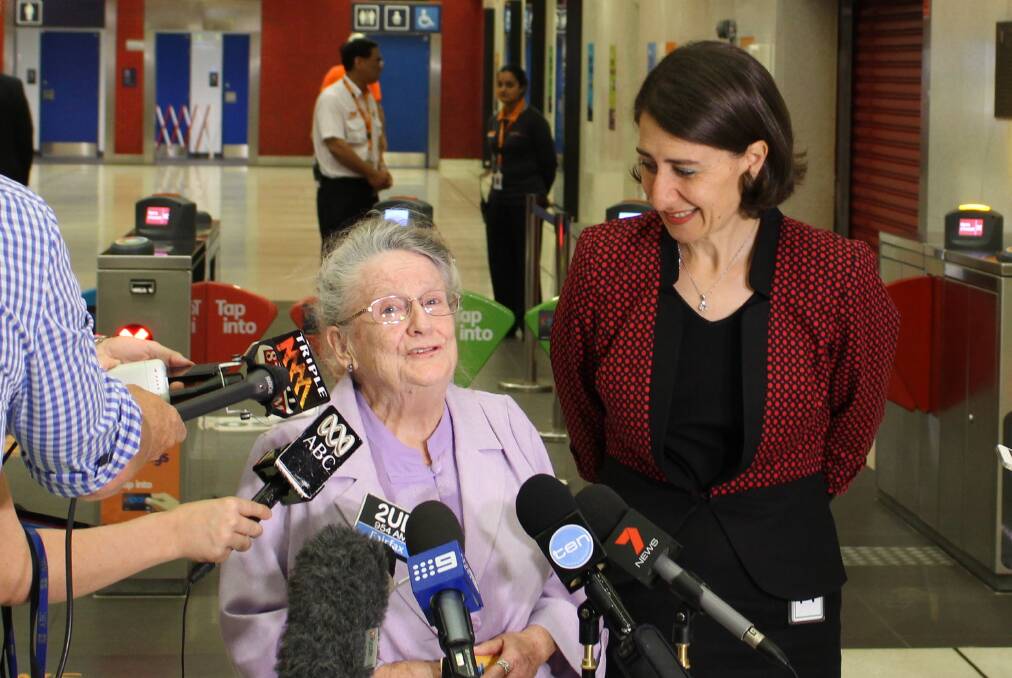 It’s gold...Gladys Berejiklian with ‘‘Betty’’, the face of a marketing campaign promoting the gold Opal card for seniors and pensioners.
