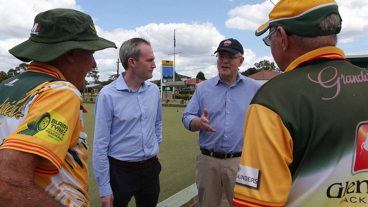 Neville Shaw and Terry Nann talk to David Coleman and Scott Morrison at Grandviews Bowling Club where Scott Morrison made an announcement about pensioners. Picture: Jane Dyson
