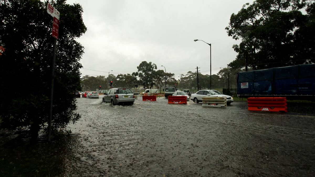 Flooding on Taren Point Rd, Taren Point. Picture Chris Lane 
