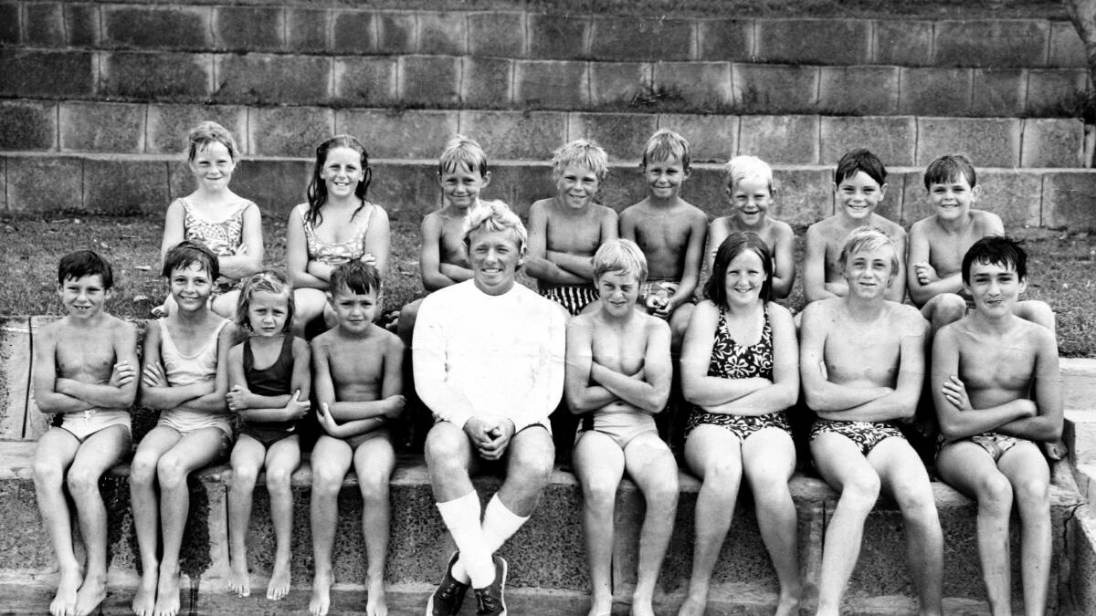Early days: Dick Caine in the 1960s with swimmers including Michelle Ford (back row, far left) and her brother Richard (back row, third from right).

