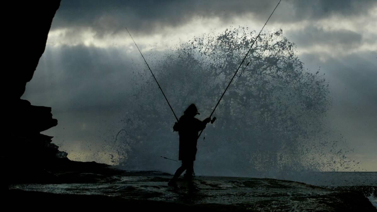 Keep it safe: A rock fisherman at Voodo Point. Picture: Anthony Johnson
