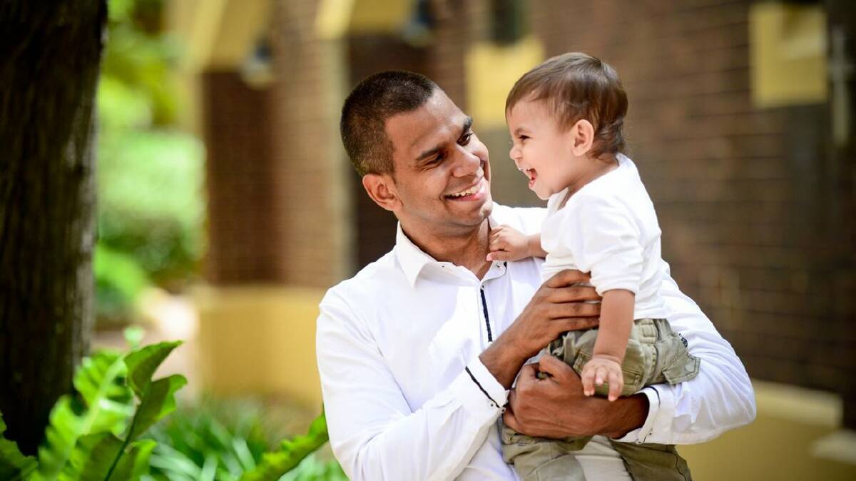 A small inspiration:Jonathon Captain-Webb and son Jandamurra. Picture: Supplied
