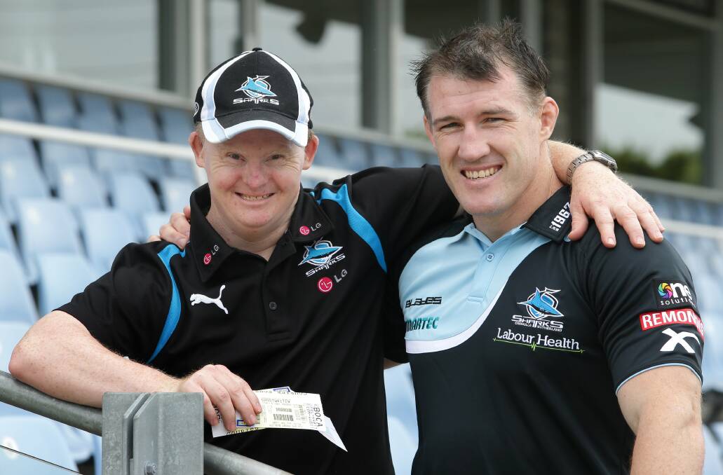 Keeping it real: Paul Gallen handed out tickets to disability services provider, Sylvanvale,  for his boxing fight on Wednesday, December 3. He is pictured with Graham Etherden from Sylvanvale. Picture John Veage.
