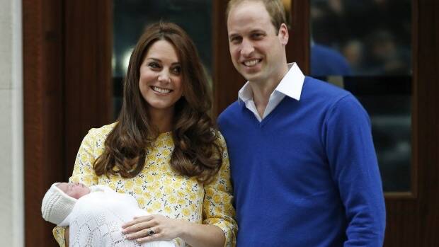 
All in a day's work: Kate Middleton and Prince William with Charlotte Elizabeth Diana. Photo: AP
