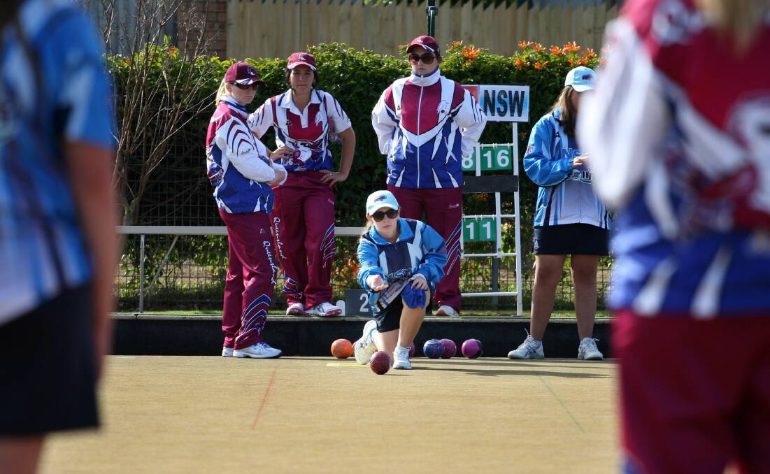 Mean on the green: NSW and Queensland under-18s team players at Taren Point Bowling Club. Picture: Sam Venn
