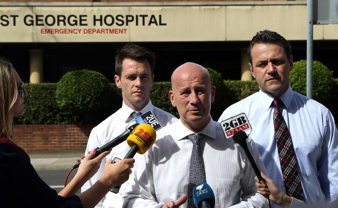 Health concern: Chris Minns (left) Opposition Leader John Robertson and Labor candidate for Rockdale Steve Kamper outside St George Hospital. Picture: John Veage

