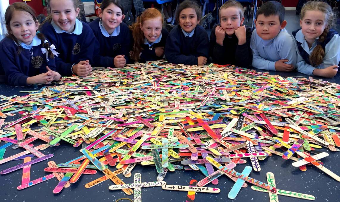 St Patrick’s Primary school at Sutherland have made 2277 Crosses in Remembrance, one for each Australian casualty at the Battle of Lone Pine, at Gallipoli which took place 100 years ago today. Picture: Supplied


