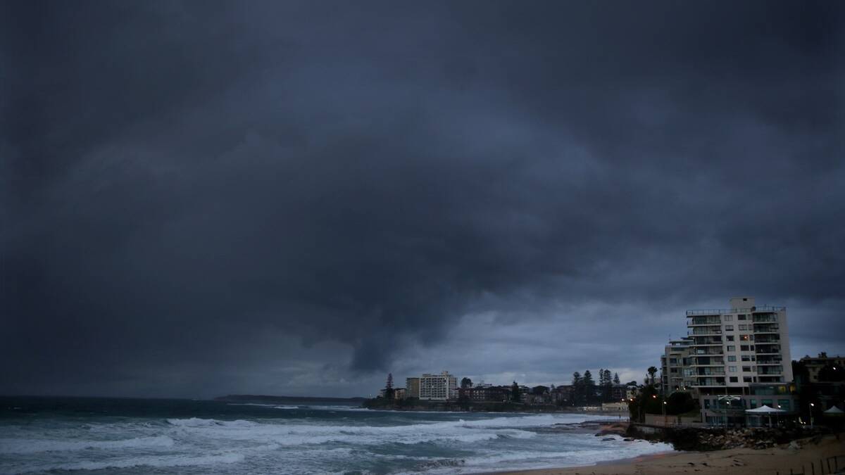 Stormy weather: The sky over Cronulla beaches on Wednesday morning. Pictures: John Veage
