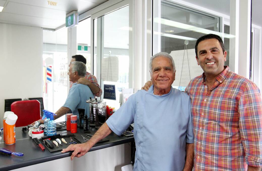 Giving back: Councillor Carmelo Pesce and his father Tony, 78, who has been a barber in Caringbah for 49 years. Below, councillor Hassan Awada. Picture: Chris Lane
