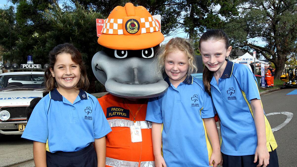 Paddy the platypus with West Bexley girl guides, Aleah, Fraeya and Olivia .Picture : Lisa McMahon.