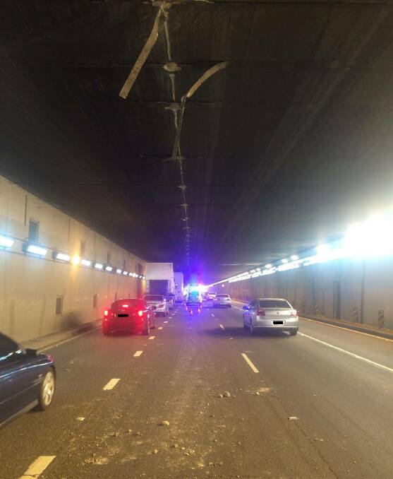 Damage: Fittings were torn from the roof of the airport tunnel because of an oversized truck. Picture: NSW Police.