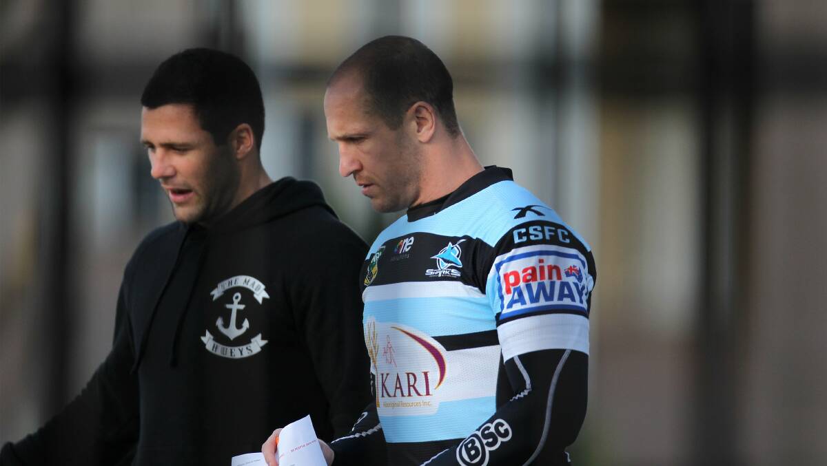 Sharks Michael Gordon and Jeff Robson at training at Remondis Stadium this week. Picture: John Veage.