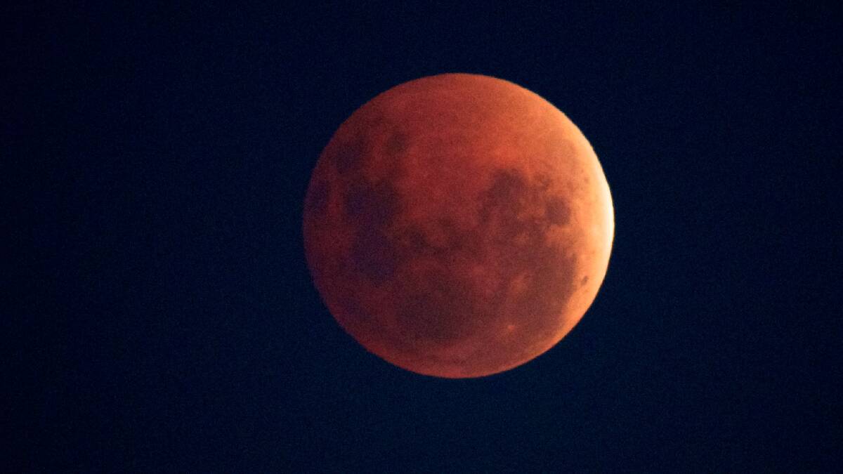 A moon of a different colour: While a blood moon does take on a reddish hue, a blue moon doesn't change. Picture: Jason South