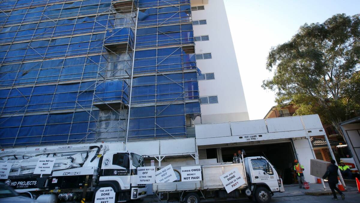 Pay claim: Rockdale construction workers protesting in front of the Rockdale building site. Picture: John Veage