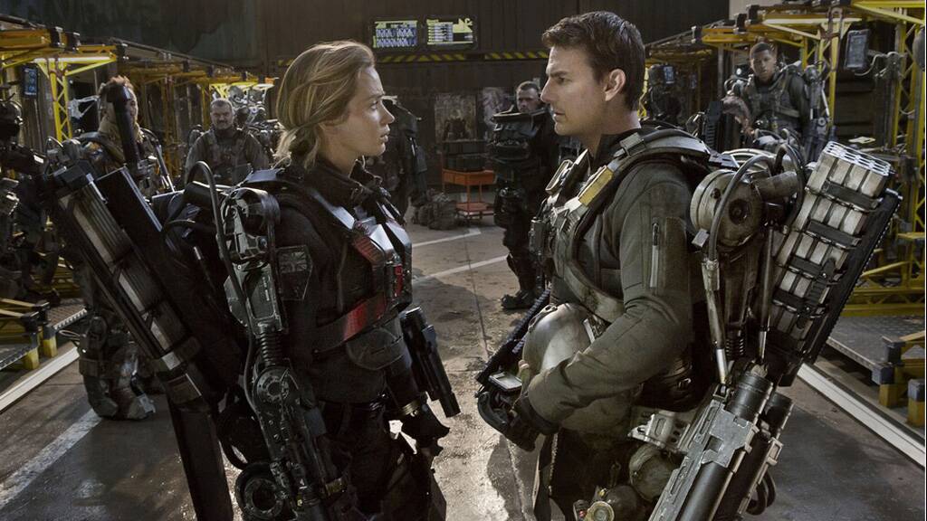 EDGE OF TOMORROW | Emily Blunt and Tom Cruise face off for time travel.