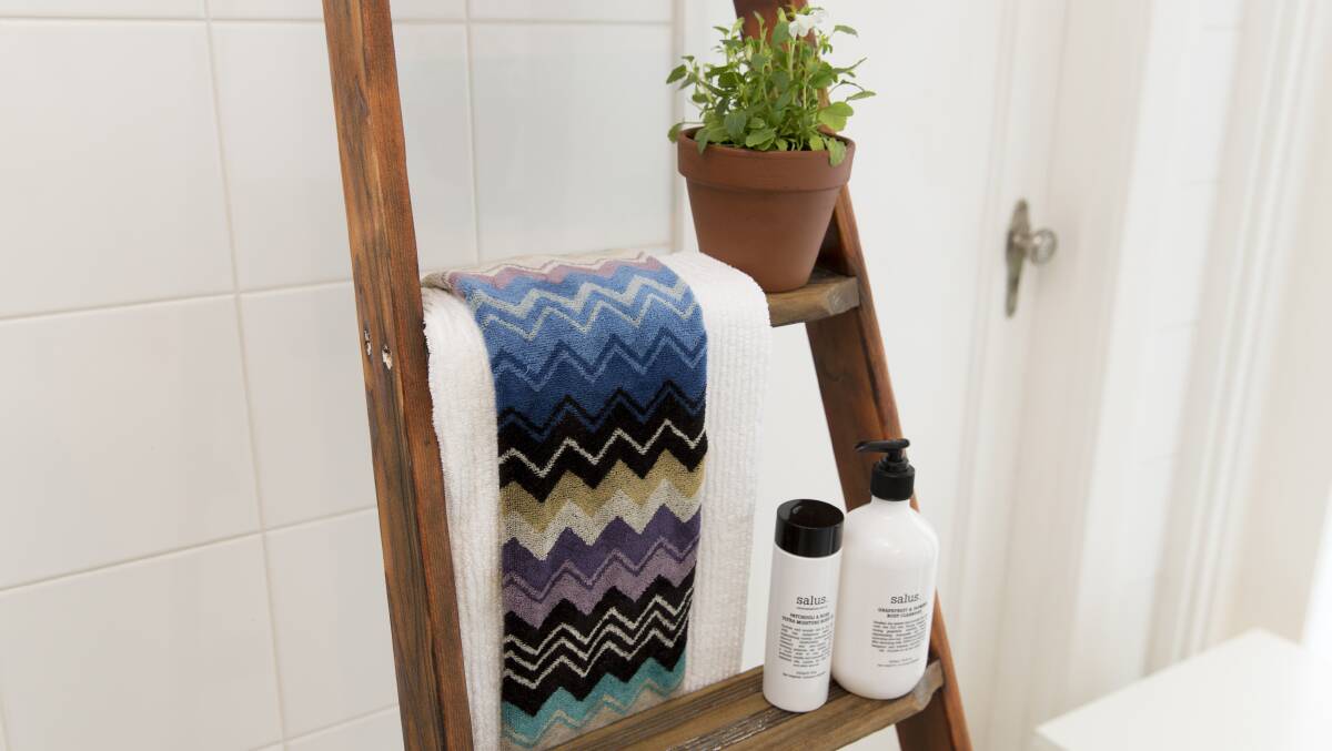 An old ladder makes the perfect towel airer rack and with a clean, sand and varnish, it can be made into a stylish addition in any bathroom.