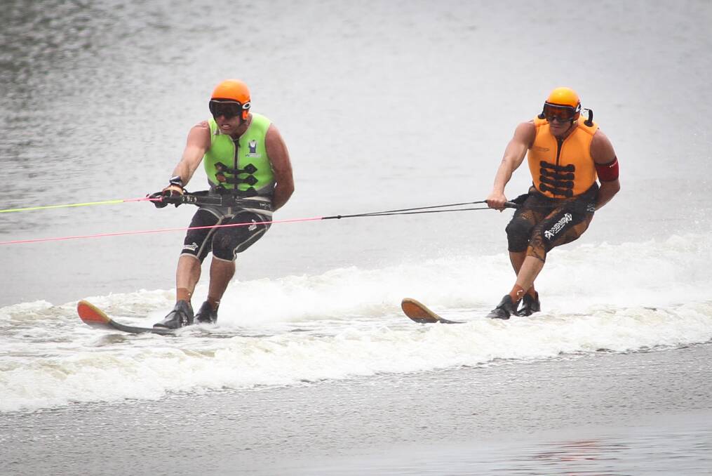 Leading the way: Peter Procter (right) with ski partner Jason Walmsley on their way to winning the Bridge to Bridge Water Ski Classic. Pictures: Geoff Jones