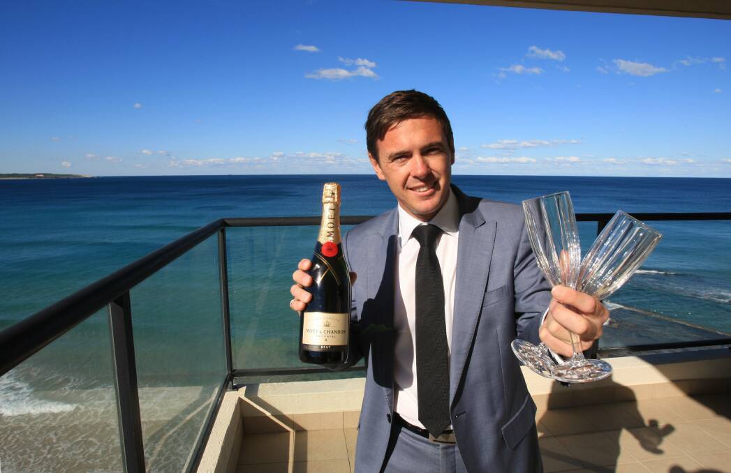 Adding the wow factor: Agent, Steve Day has canapés, drinks and entertainers during his open houses. Picture: James Alcock.