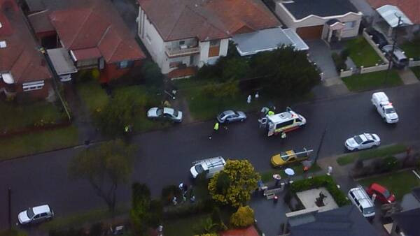 Crash scene: A helicopter lands on Morgan Street, Kingsgrove after an accident. 