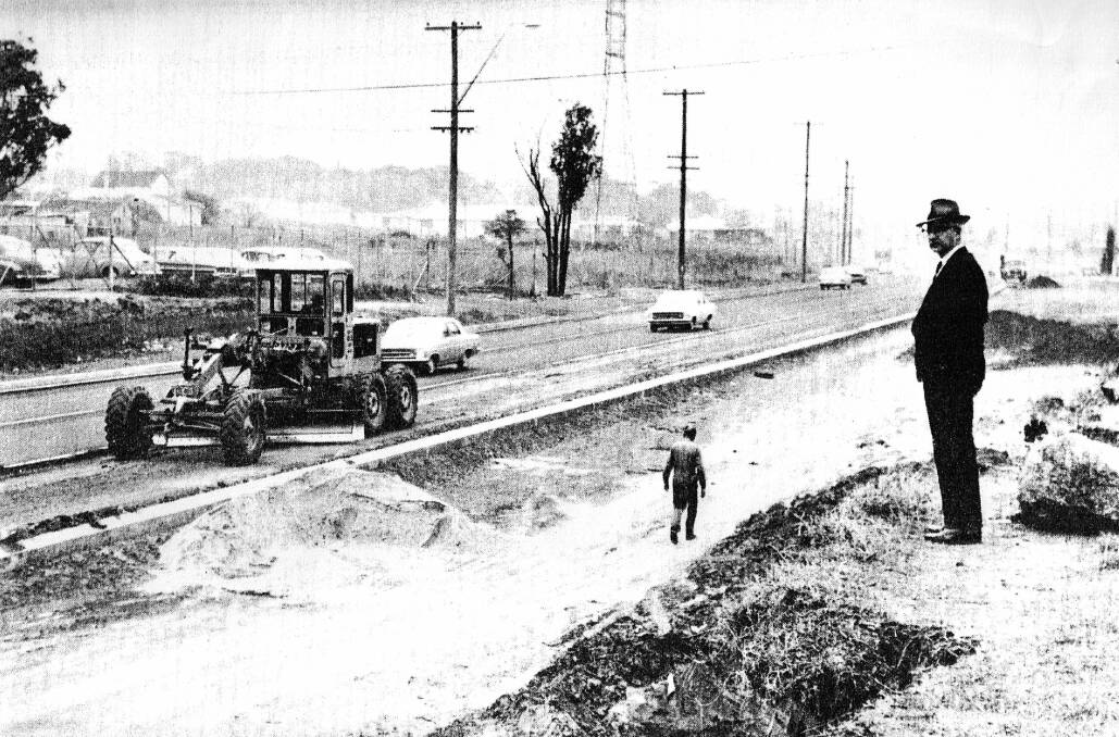 Major challenge: Deputy shire engineer Harold O?Brien checking the progress of road construction in the 1960s.