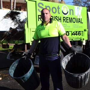 Not happy: Joseph Sabbagh is annoyed  he has to pass on to  customers an increased fee he also pays to dispose of rubbish.  Picture: Jane Dyson