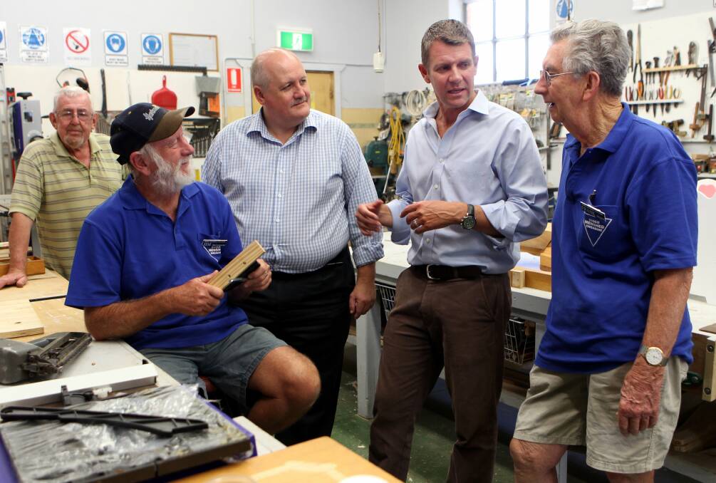 Heathcote MP Lee Evans and Treasurer Mike Baird discuss Bosco menshed's application for funding through the NSW Government's Community Building Partnership program with Jim McGuinness (left) and Frank Burgess (right). Picture: Jane Dyson