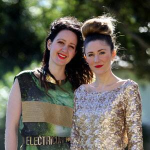 Tech-style: Best friends Ainslee Walton and Leah Hassard, both 25, developed an app to encourage fashion-followers to interact online. Picture: Chris Lane 
