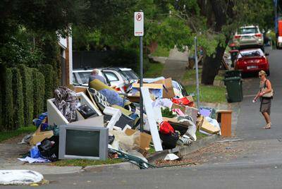 Dumped: Sutherland Shire Council has shelved the twice-yearly council clean-up following scenes such as this one on Burraneer Bay Road earlier this year. Picture: James Alcock