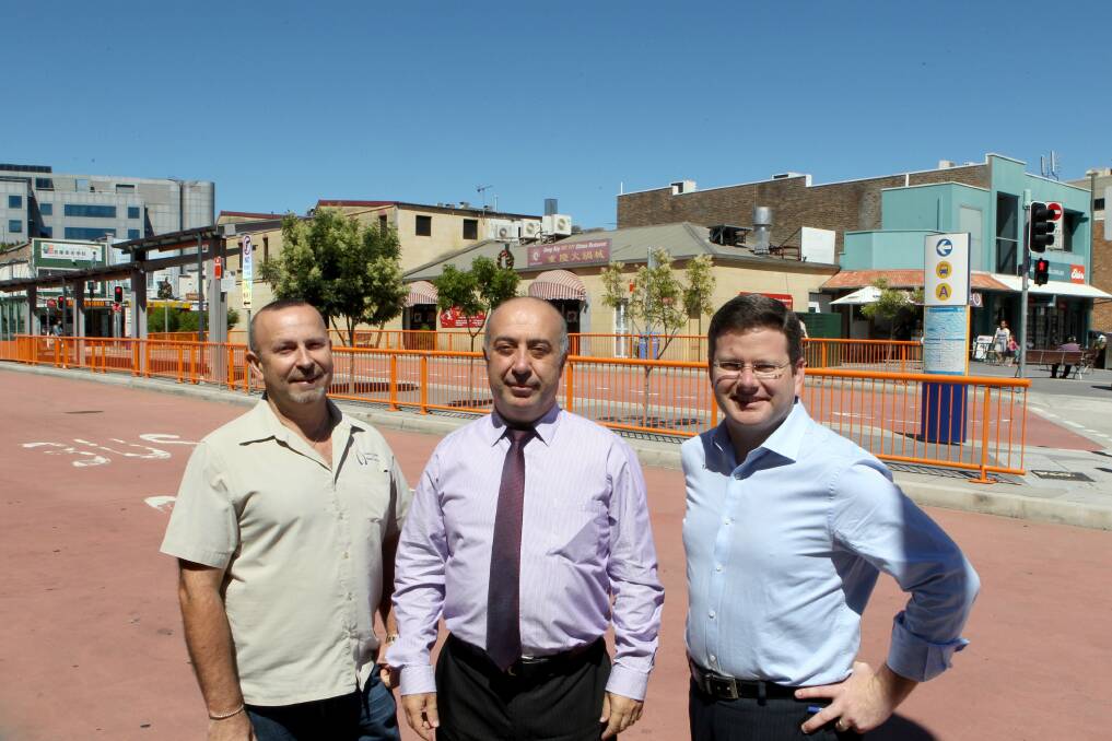 A sure thing: Public toilets will be built at Hurstville's bus interchange, which is good news for Lou Konjarski, Hurstville mayor Jack Jacovou and Mark Coure. Picture: Lisa McMahon