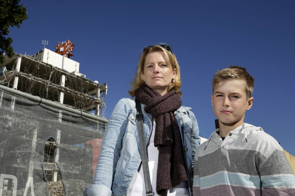 23.7.13 Michelle Chabi and her son, Myles, 10, are among residents who want the star on top of Westfield Miranda saved. Picture: Anna Warr
