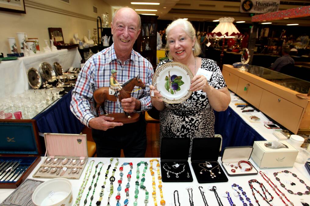 Old and valuable: Peter Marr and Caroline Marr show some of the items at the Hurstville Rotary Antiques and Collectables fair. Picture: Jane Dyson
