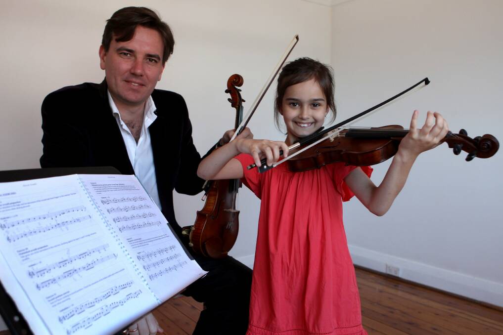 Music to your ears: Vov Dylan with one of his young students, Mila Bockaroska. Picture: Jane Dyson