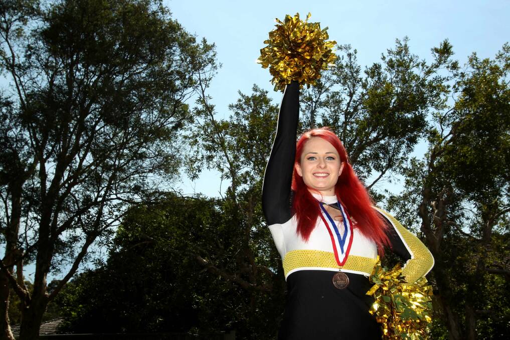 Cheerful: Megan Cooney competed in a cheerleading tournament in the US. Picture: Chris Lane