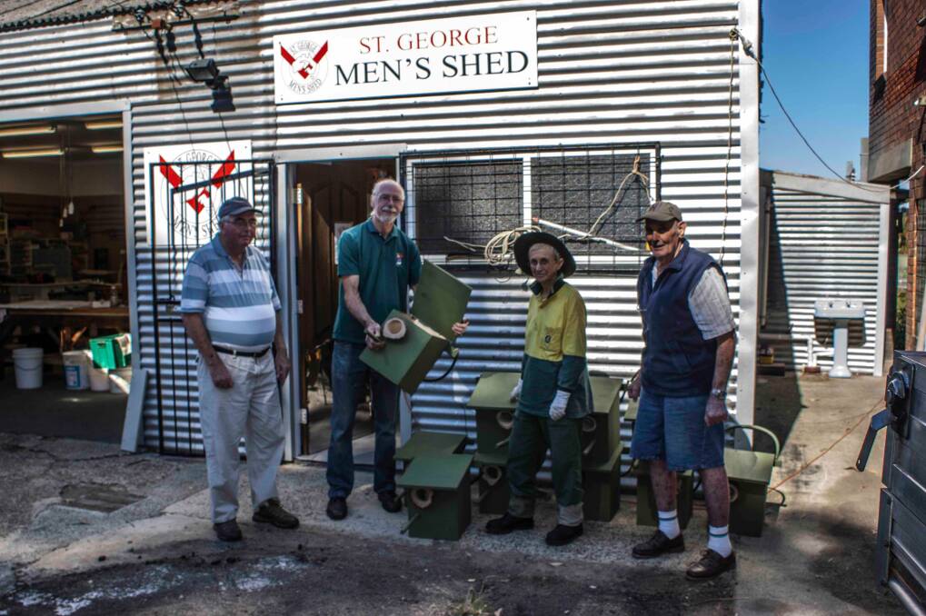 Possum homes: (from left) Glenn Crane, Hans Schurch, Heather Stolle and the late Jimmy Duggan with boxes made at St George Men's Shed.