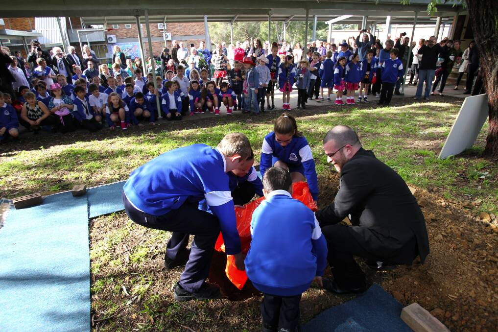 Sealed history: Peakhurst South Public School buried another time capsule on the open day. Picture John Veage