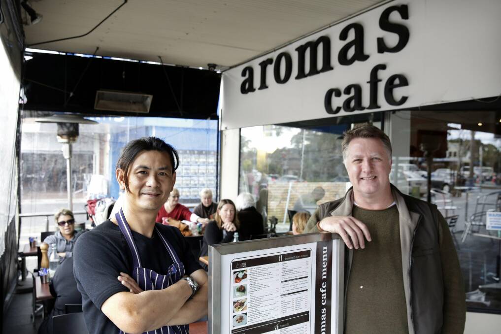 Revamped: Aromas Cafe's new chef David Lee and Marty McKowen, co-owner, with the expanded menu. Picture: Anna Warr