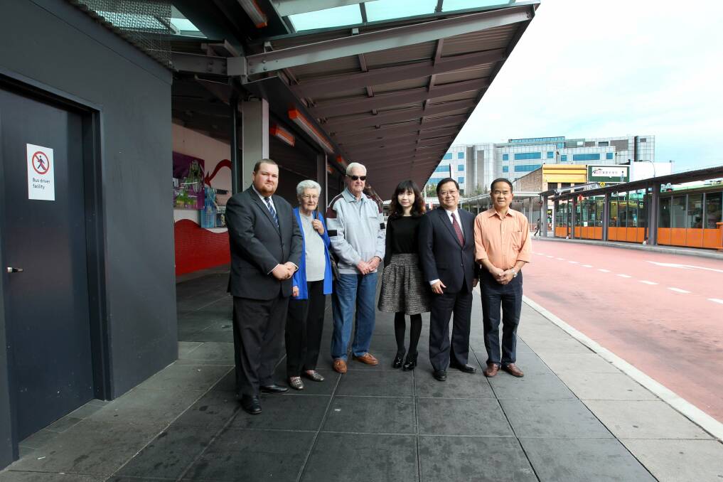 Promise not kept: Hurstville Council talked about building toilets at the bus stop but has not done so. Justin Mining, Betty and Jack Haran, Michelle Li, Dominic Sin and Zhong Li. Picture: Lisa McMahon