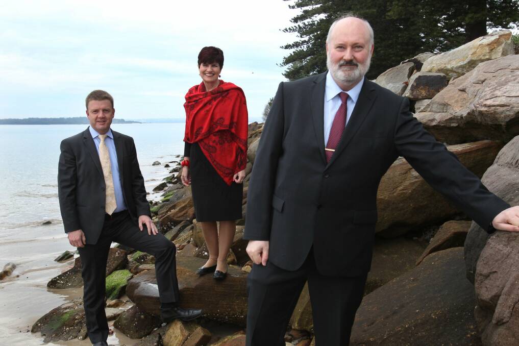 Sand plan: Environment Minister Robyn Parker, with Rockdale MP John Flowers (foreground) and Rockdale mayor Shane O'Brien, announces a grant to counter sand erosion on the foreshore at Sandrinhgam. Picture: Jane Dyson