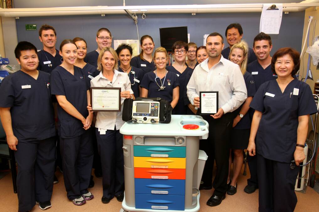 Be a winner: St George Hospital nurses celebrate being part of the College of Emergency Nursing Australasia's Emergency Department of the Year 2013. Picture: Jane Dyson