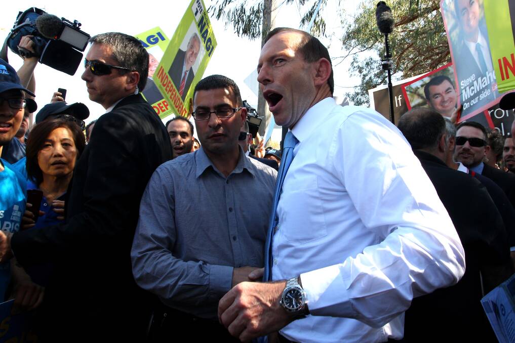 Short stay: Tony Abbott with Nick Varvaris (left) at Athelstane Public School. Picture: Nick Moir