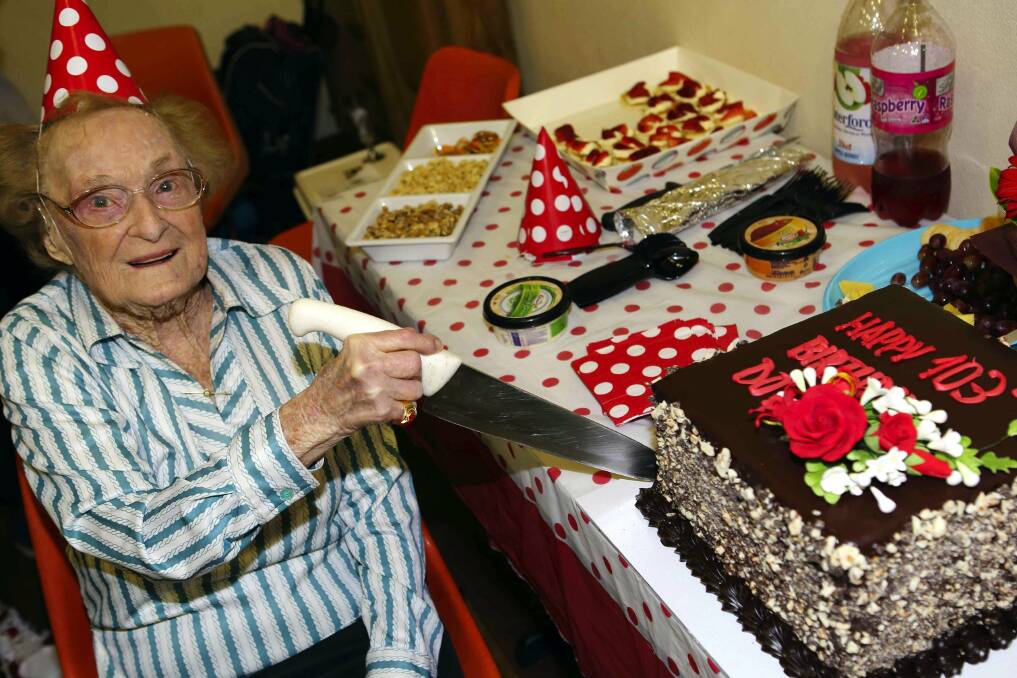 Still playing: Table tennis veteran Dorothy De Low celebtrated her 103rd birthday at a surprise birthday party at the Kogarah RSL Table Tennis Club.