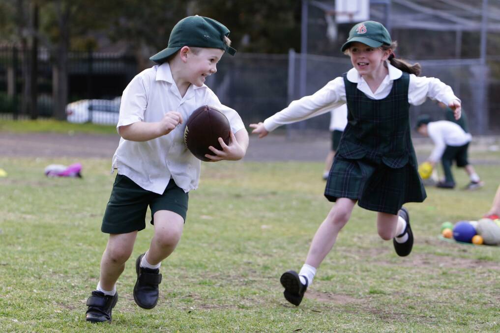 kids taking part in federally funded sports program to go with election story of ALP pledge for more funding for before and after school care services.Picture Anna Warr