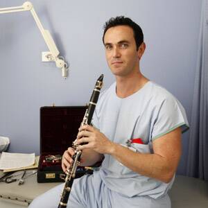 Breath of fresh air: Anaesthetist Dr Andrew Kennedy will do everything to keep you awake with his clarinet, which he’s played for 25 years. Picture: Anna Warr