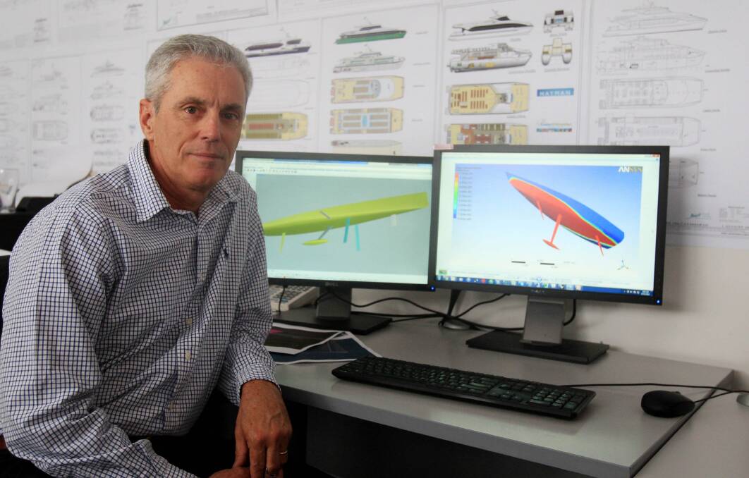 Gun designer: World champion yachtsman Steve Quigley in his design office at Kogarah. Picture: Chris Lane