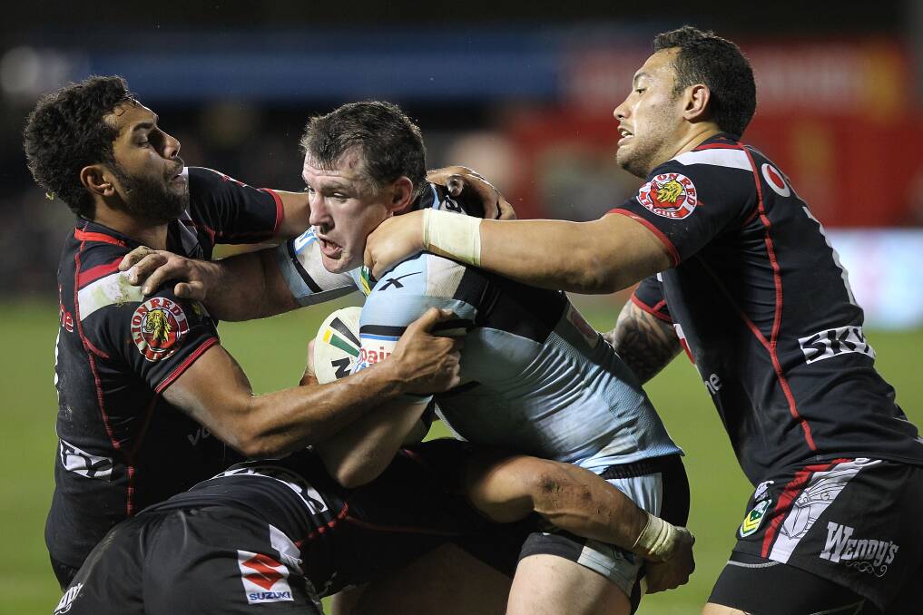 Another carry: Sharks captain Paul Gallen played almost the entire first grade game against the Warriors after two months on the sideline. Picture: Fiona Goodall, Getty Images