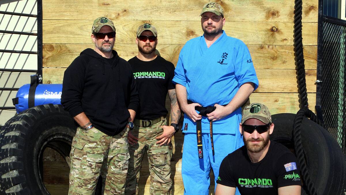 Commando Tough: (From left) Nick, Scott, Paul and Rhys instructing sporting and fitness students. Picture: Lisa McMahon