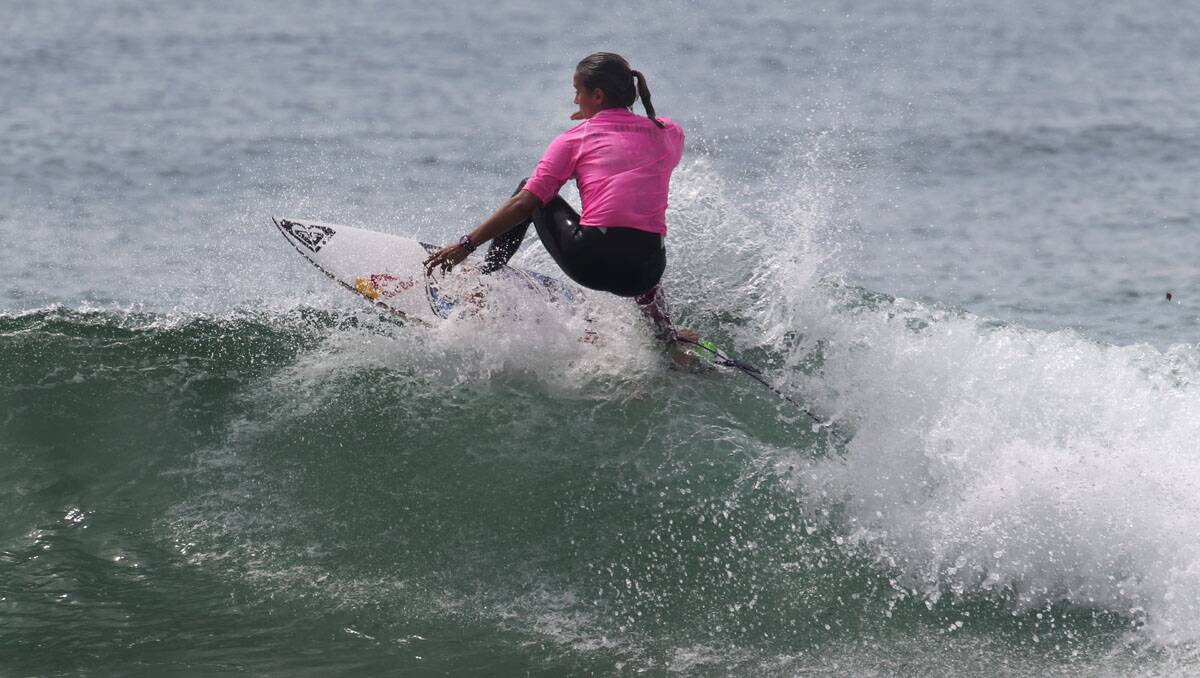 Sally surfing against the men.Picture John Veage
