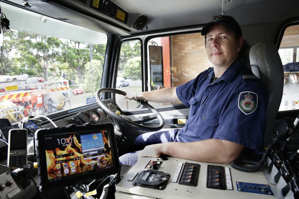 Tech experts: Loftus Volunteer Bushfire Brigade show off their IT advancements made possible through community donations. Picture: Anna Warr