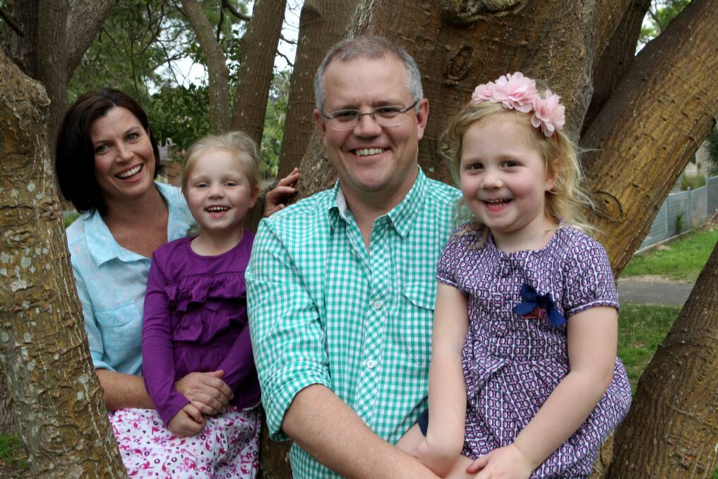 Family celebration: Cook MP Scott Morrison and his family, wife Jenny and daughters Abbey and Lily, celebrate his win. Picture: Jane Dyson