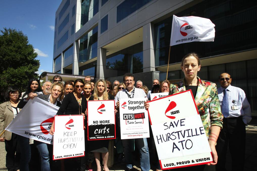 Tax write-off:  Union delegate Emma Groube (front) and staff outside the Hurstville office yesterday. Picture: Jane Dyson